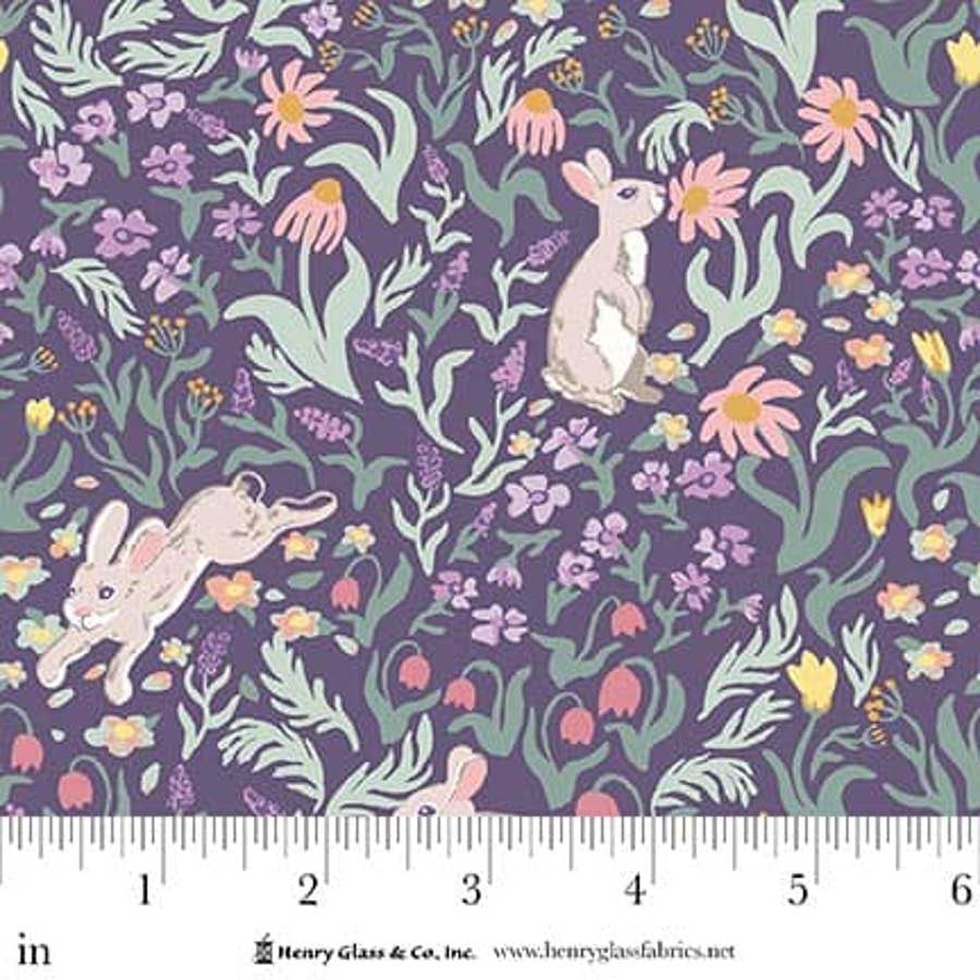 Bunnies and flowers fabric on a purple background, from Henry Glass & Co.