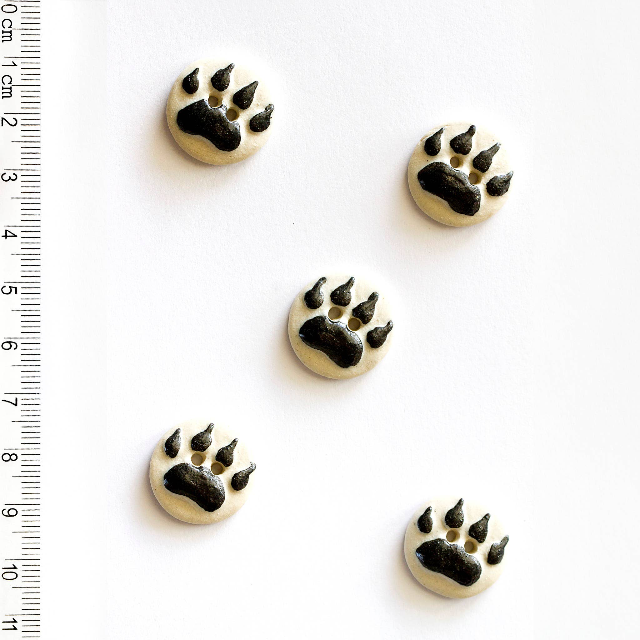 Handmade Black and White Paw Print Buttons